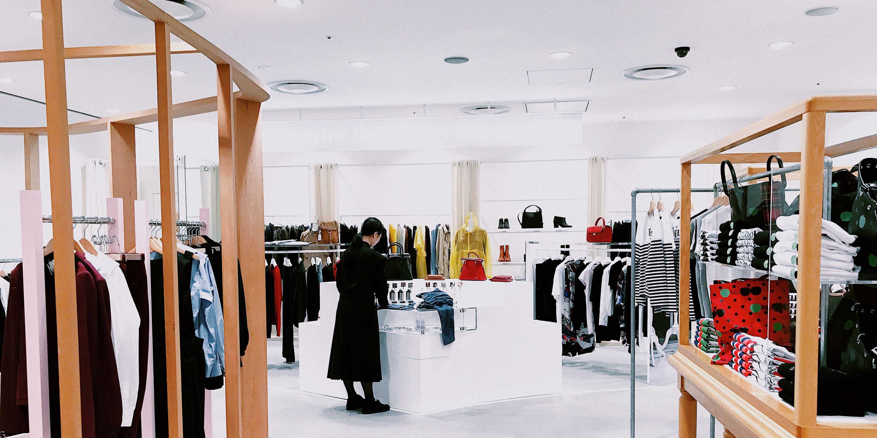white and sterile retail environment selling clothing